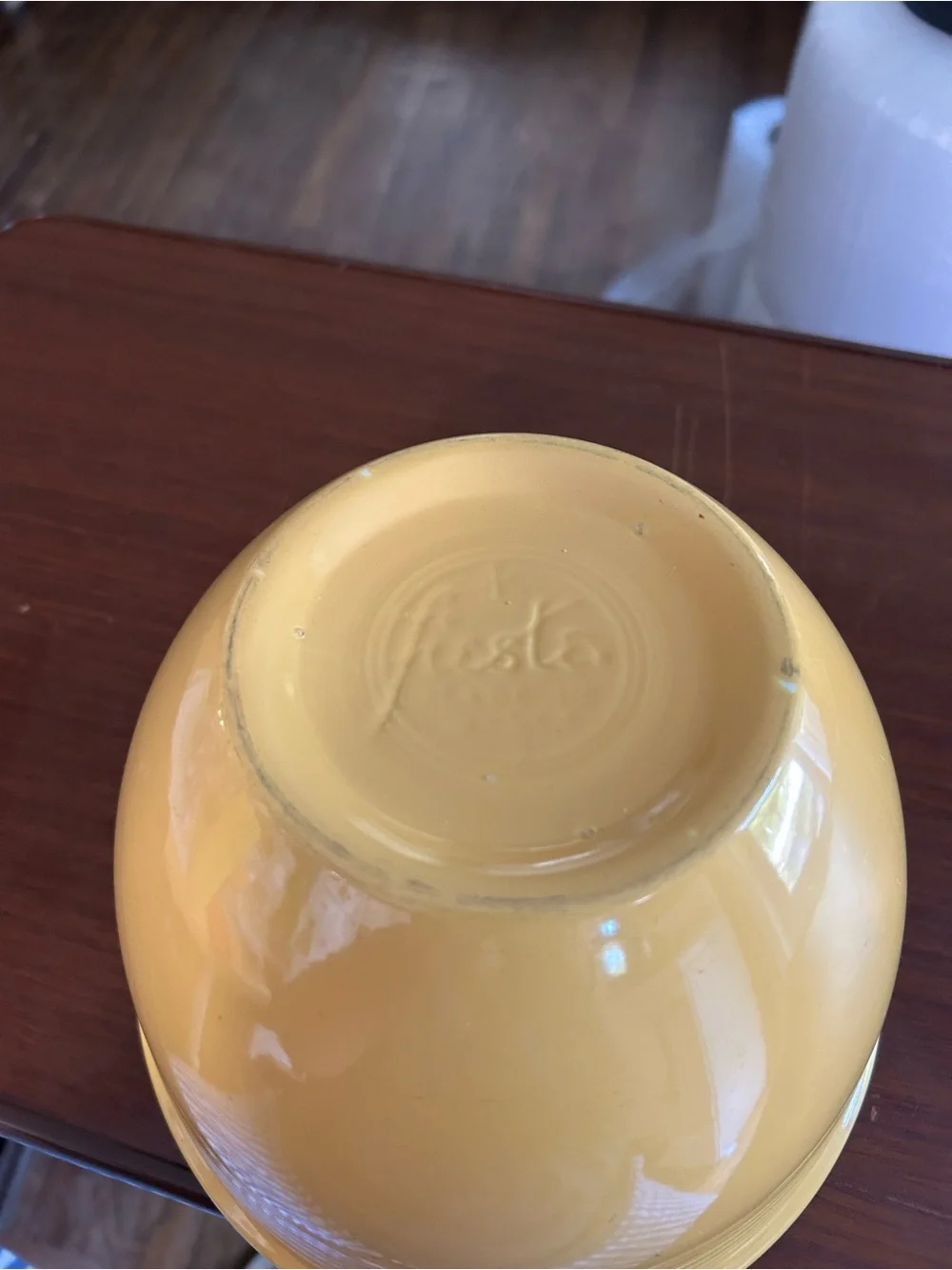 Vintage fiestaware yellow mixing bowl two chips on the rim, 8 3/4”wide x 6 1/2”